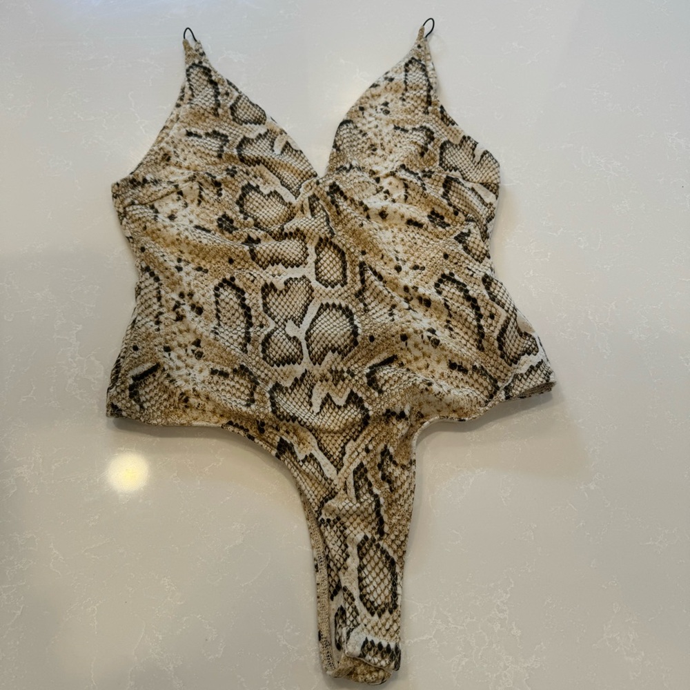 ASTR The Label tank top. Fun snake skin print. Good condition. Size M